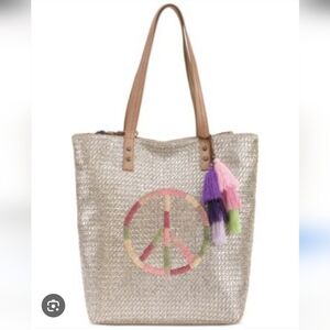 the Sak Palisade Woven Tote Bag   Peace Sign Tassel.